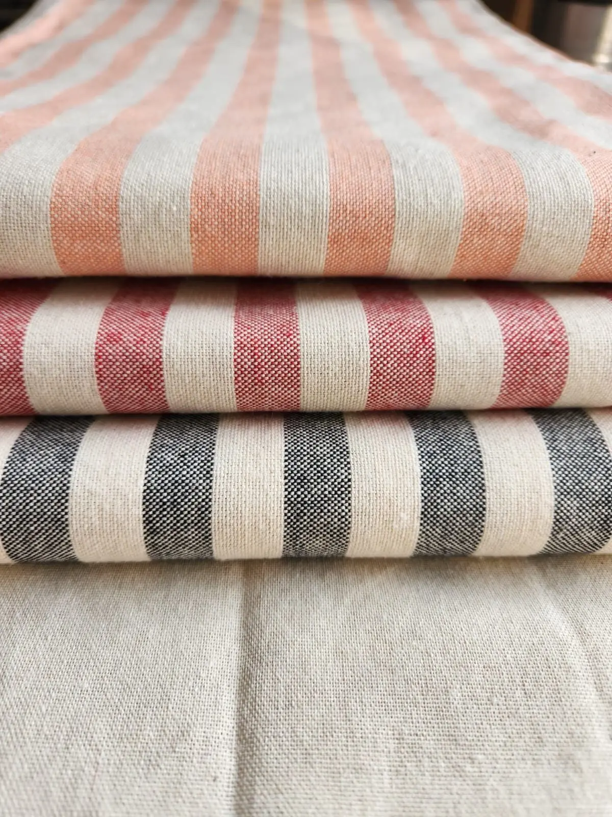 Melange fabric rolls in multiple colours
