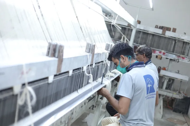 Indian factory workers spinning